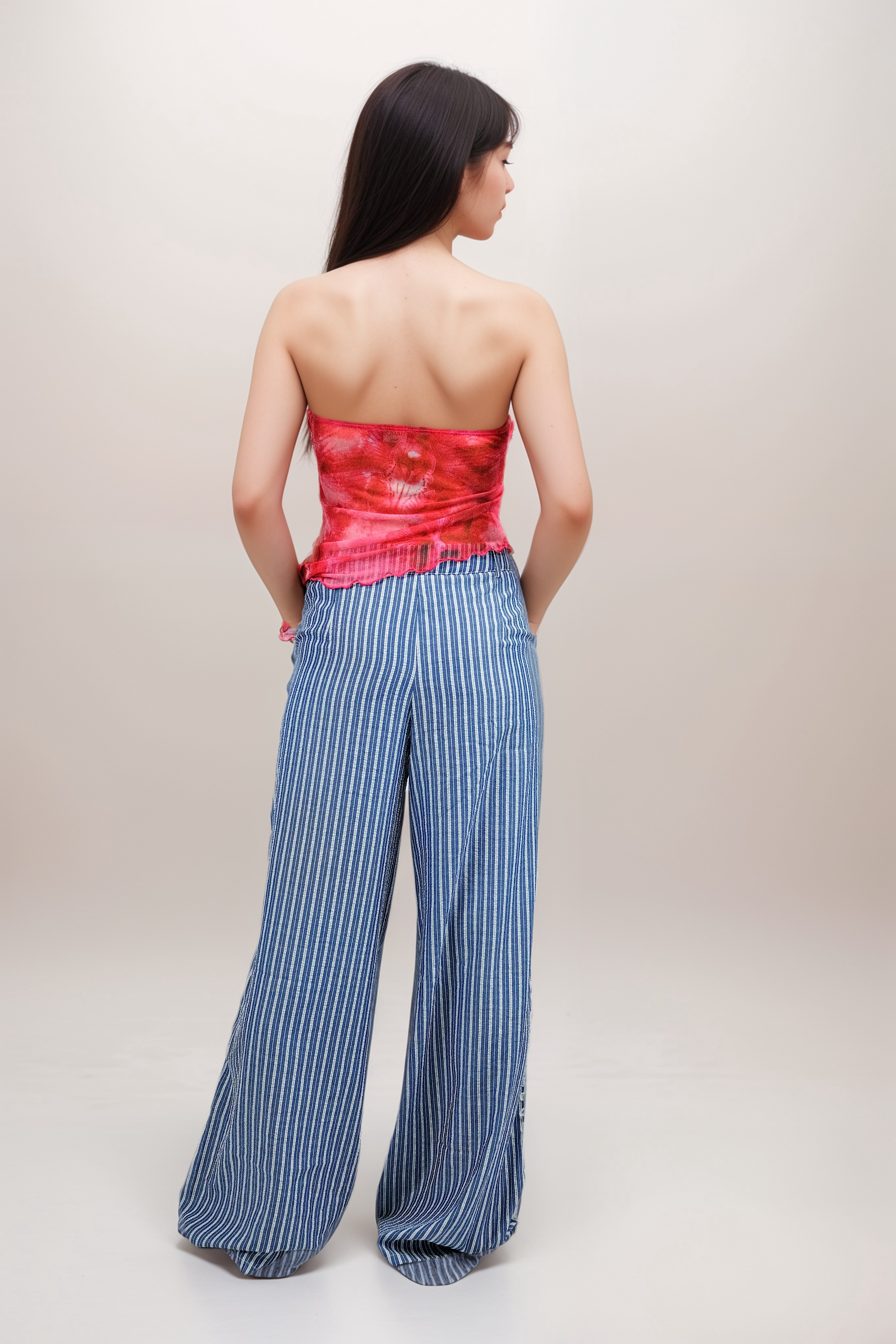Pantalones casuales holgados a rayas con cintura baja