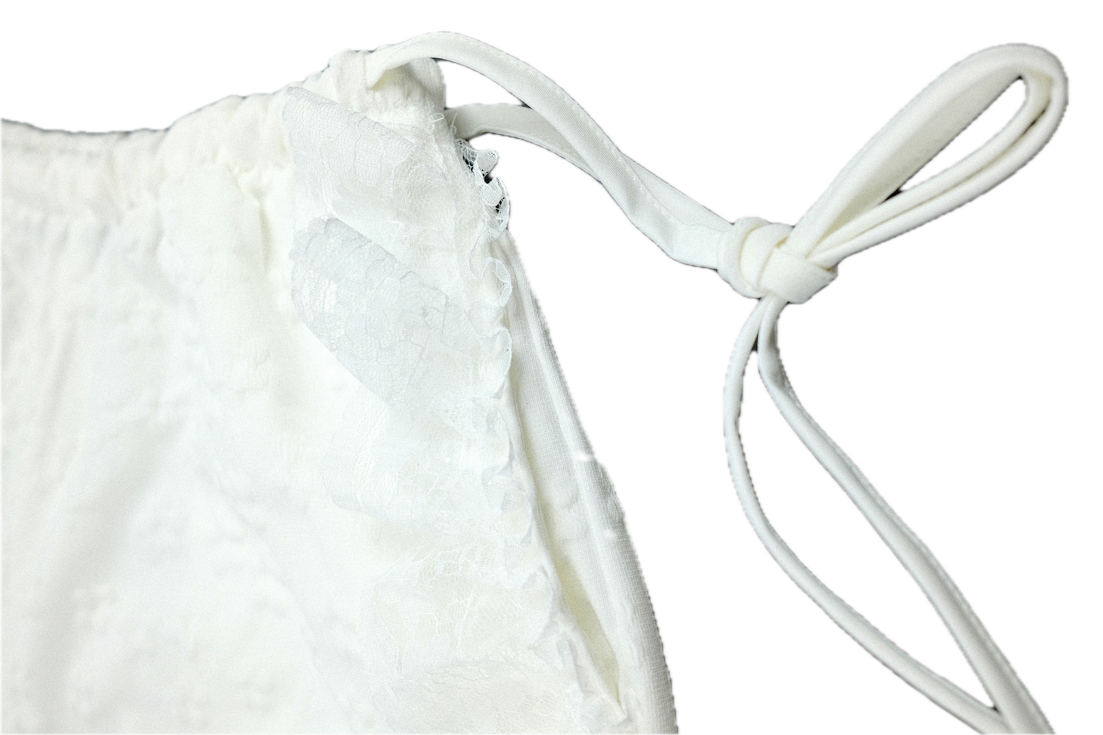 Pantalones largos de punto con cordón blanco y detalle de encaje
